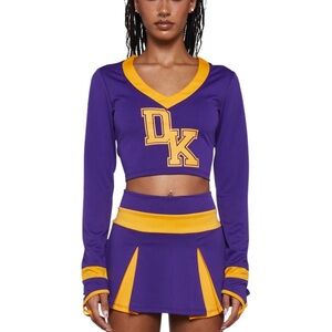 Dolls Kill Purple and Gold Cheerleader costume - Megan Fox costume